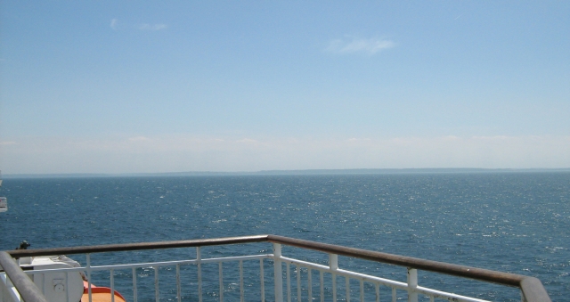 looking over to france in the distance from the ferry out at sea